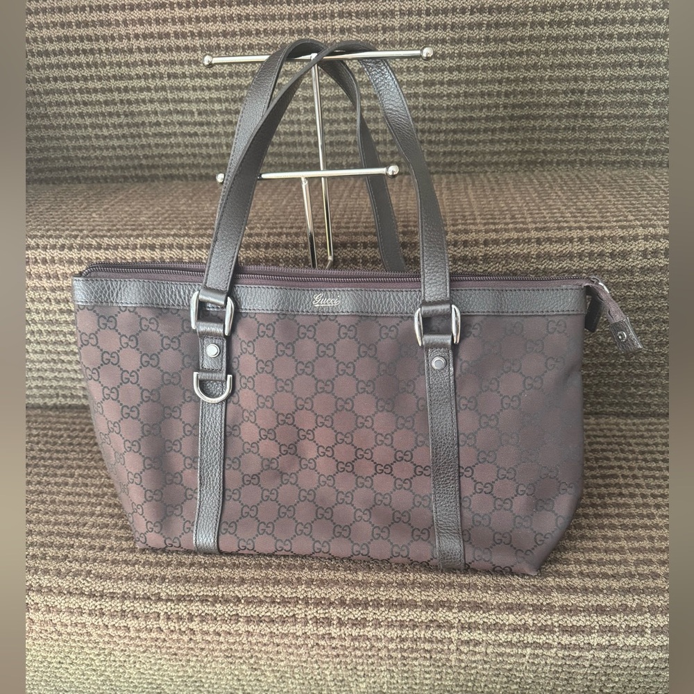 Gucci Bag. Brown with brown leather excellent condition. 100% authentic